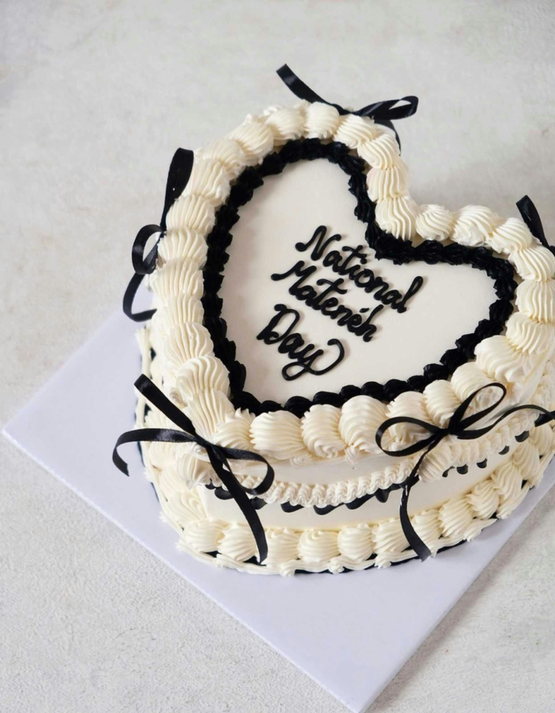beige and black royal vintage celebration cake