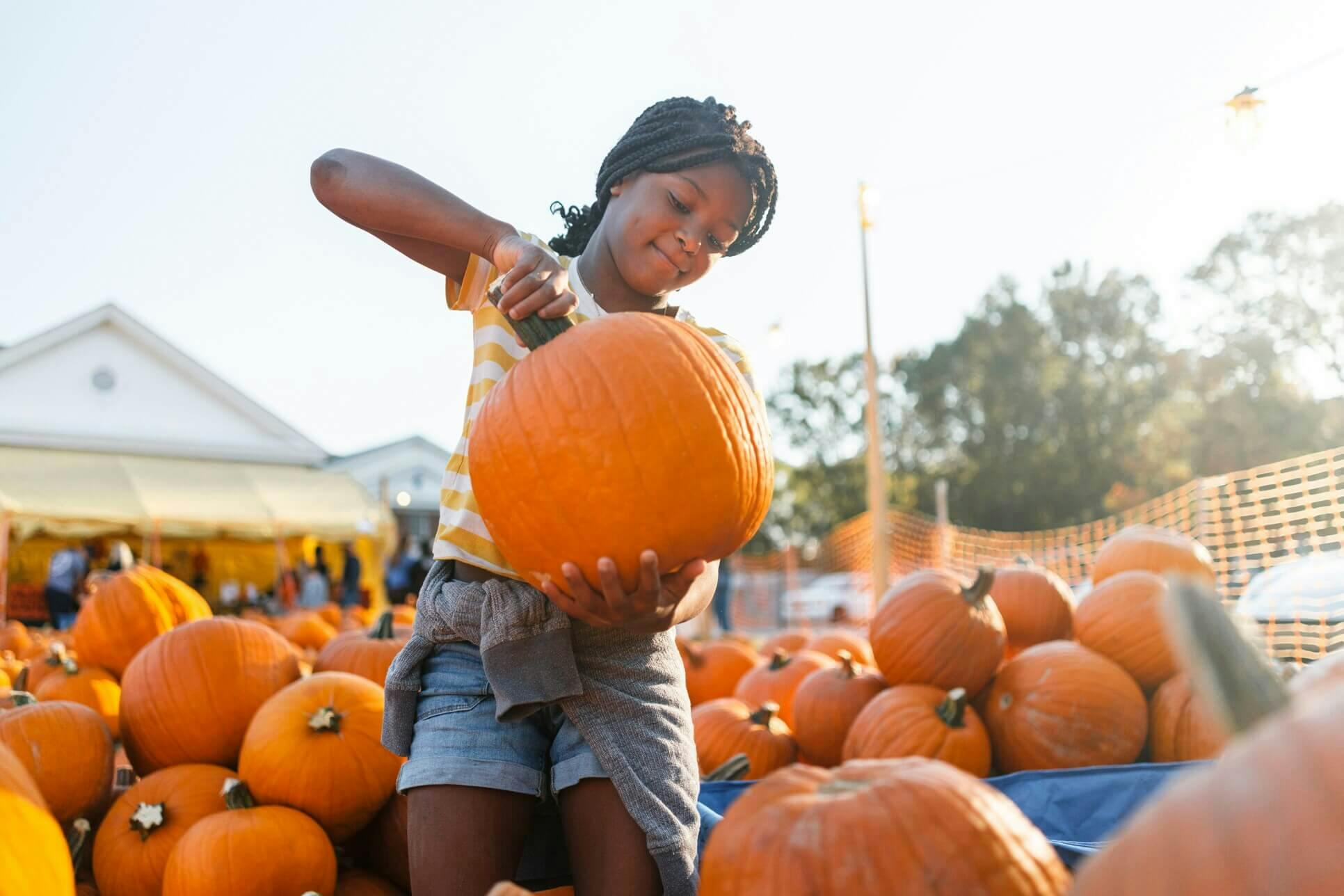 Girl at pumkin patch