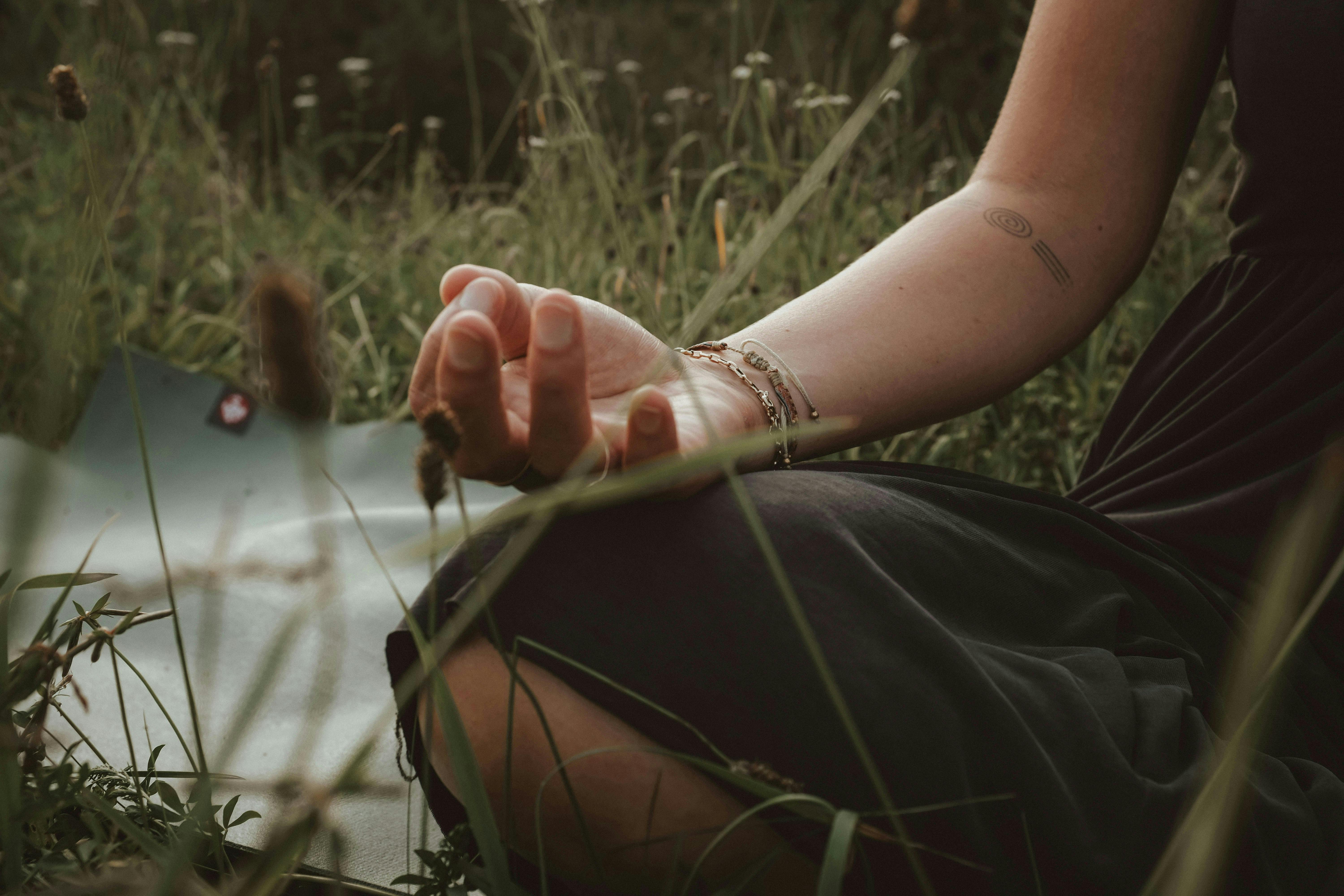 Woman in nature yoga pose
