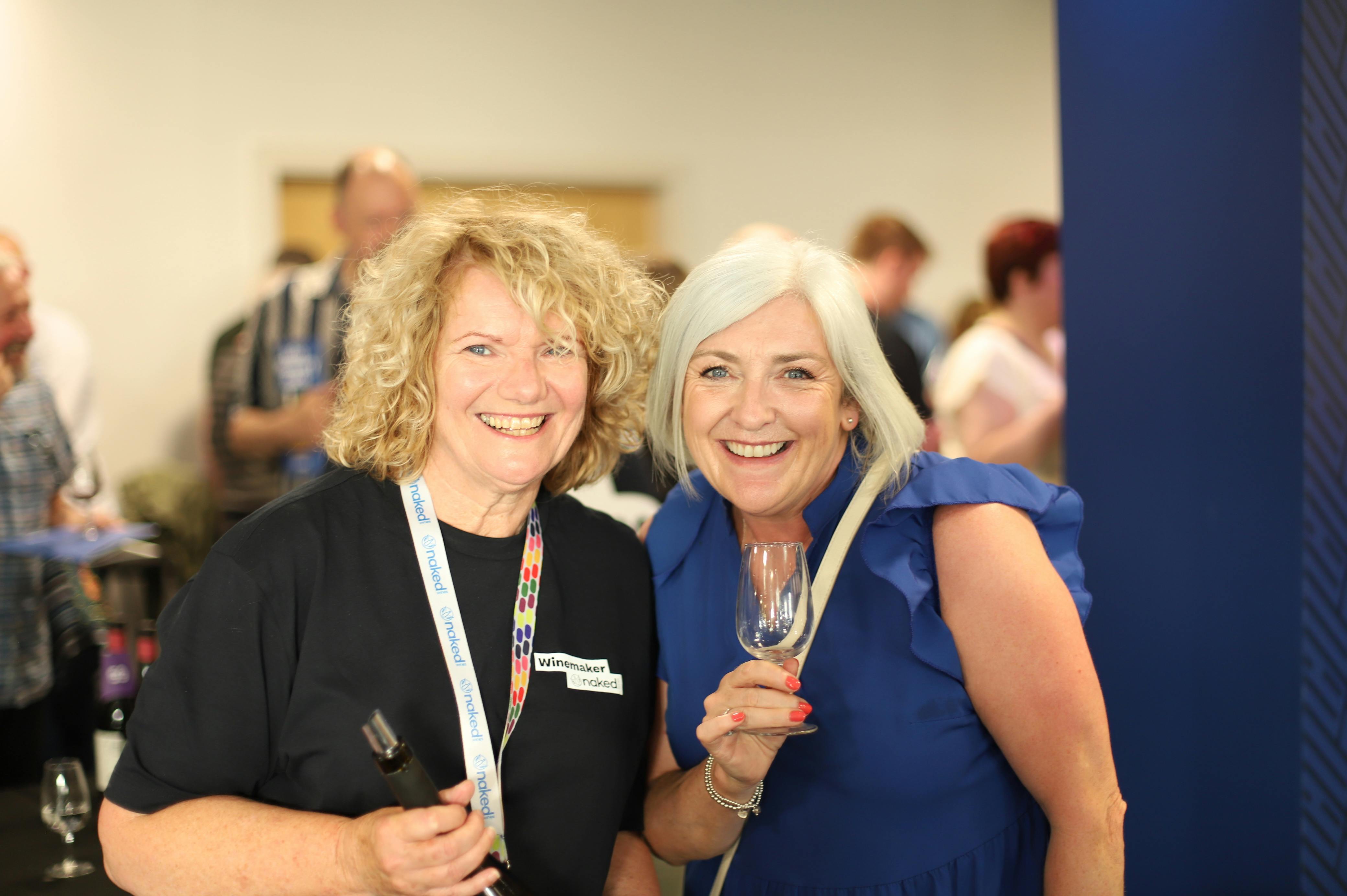 Two women at the Naked Wines tour posing for a photo