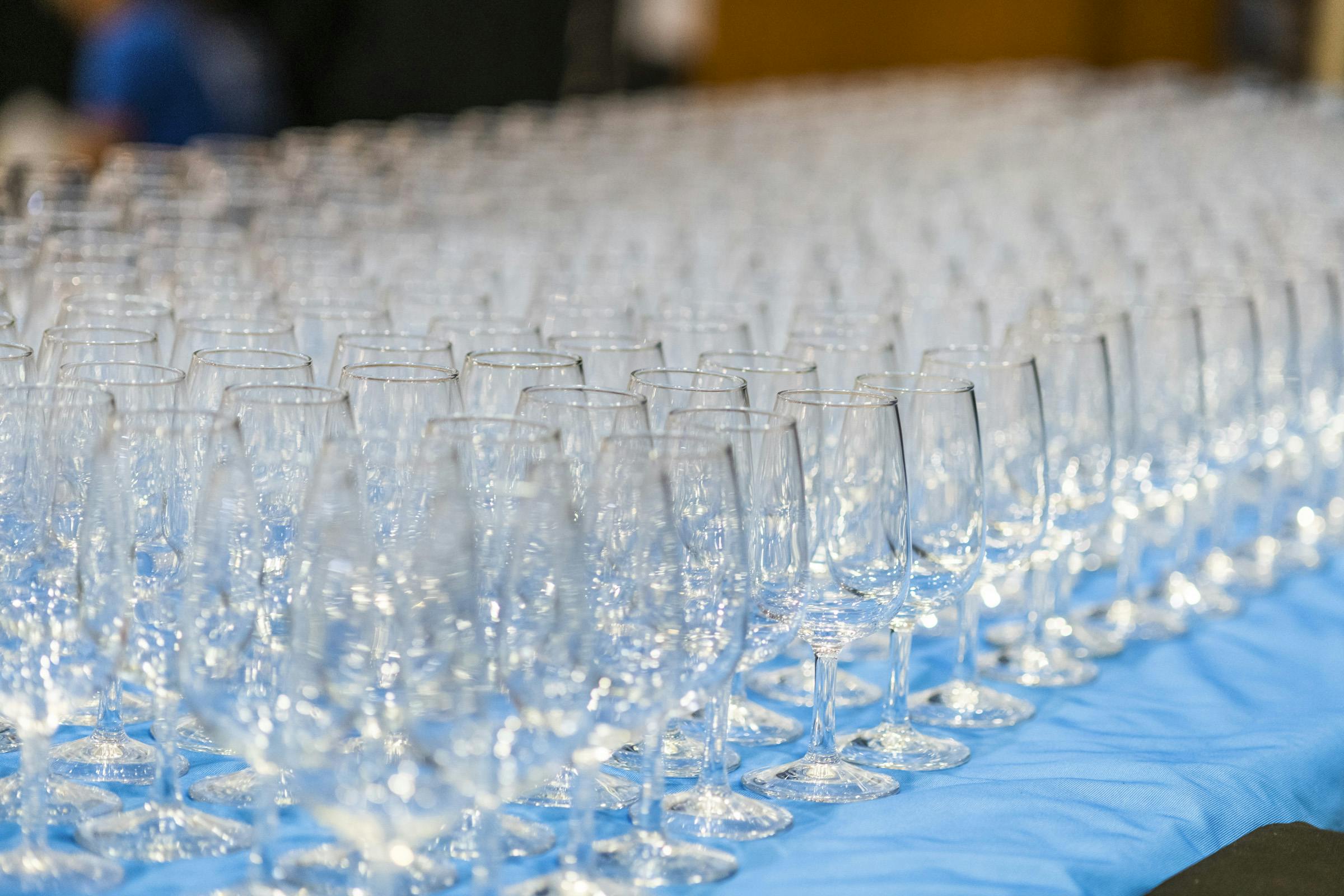 A table filled with wine glasses
