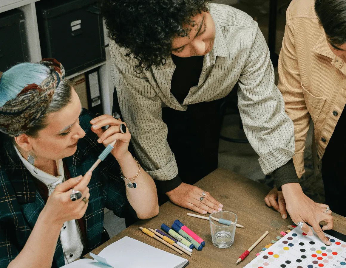 People planning an event at desk
