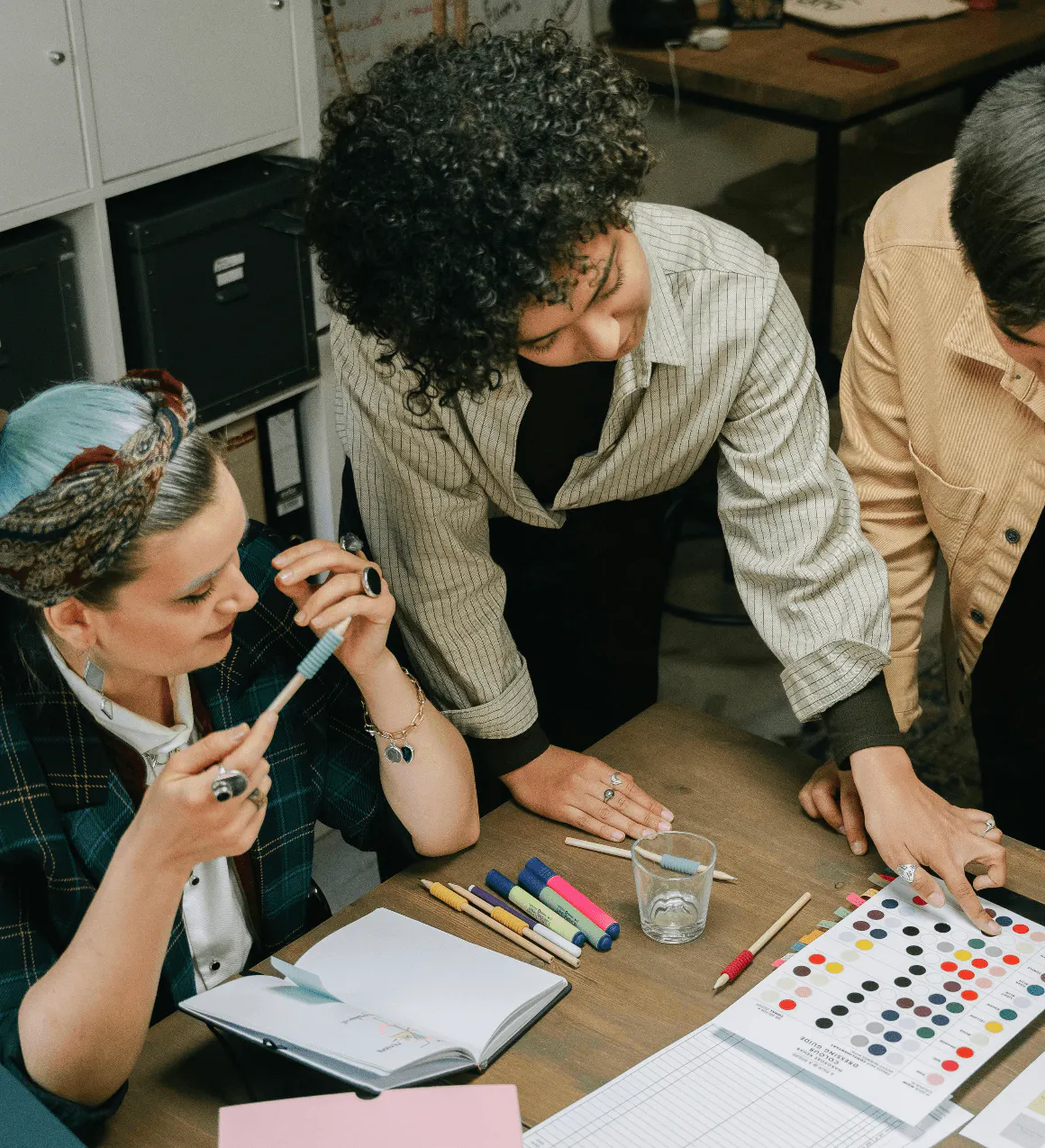 People planning an event at desk