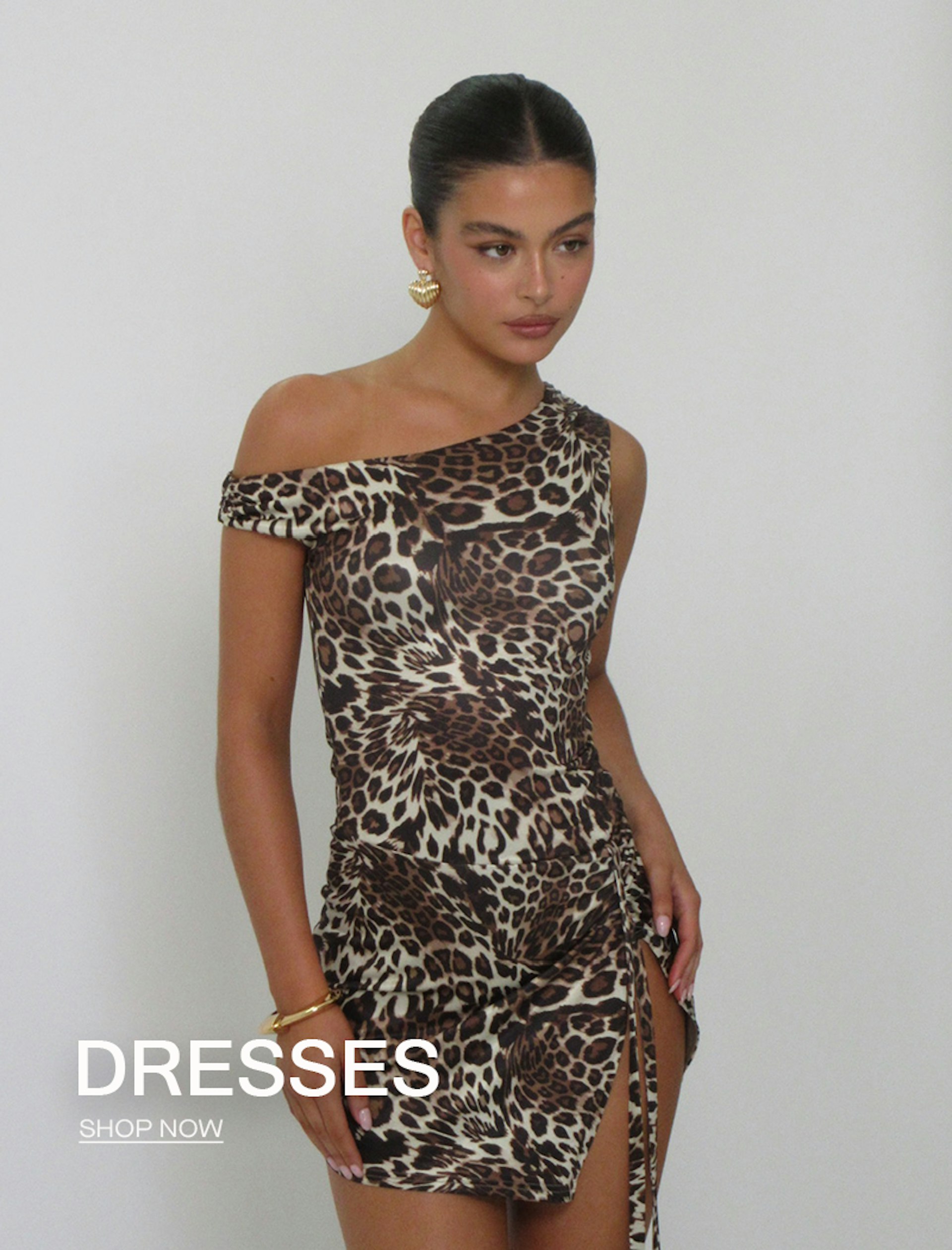 Model wearing a leopard print mini dress