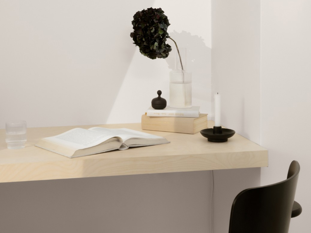 White wall with pine desk