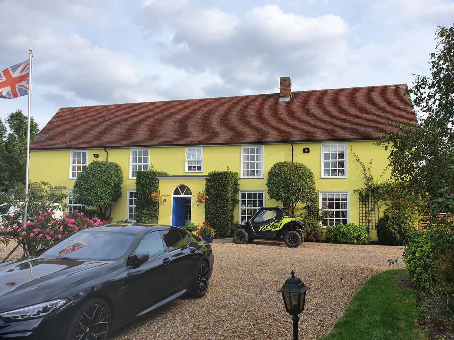 wide angle before image of a large house