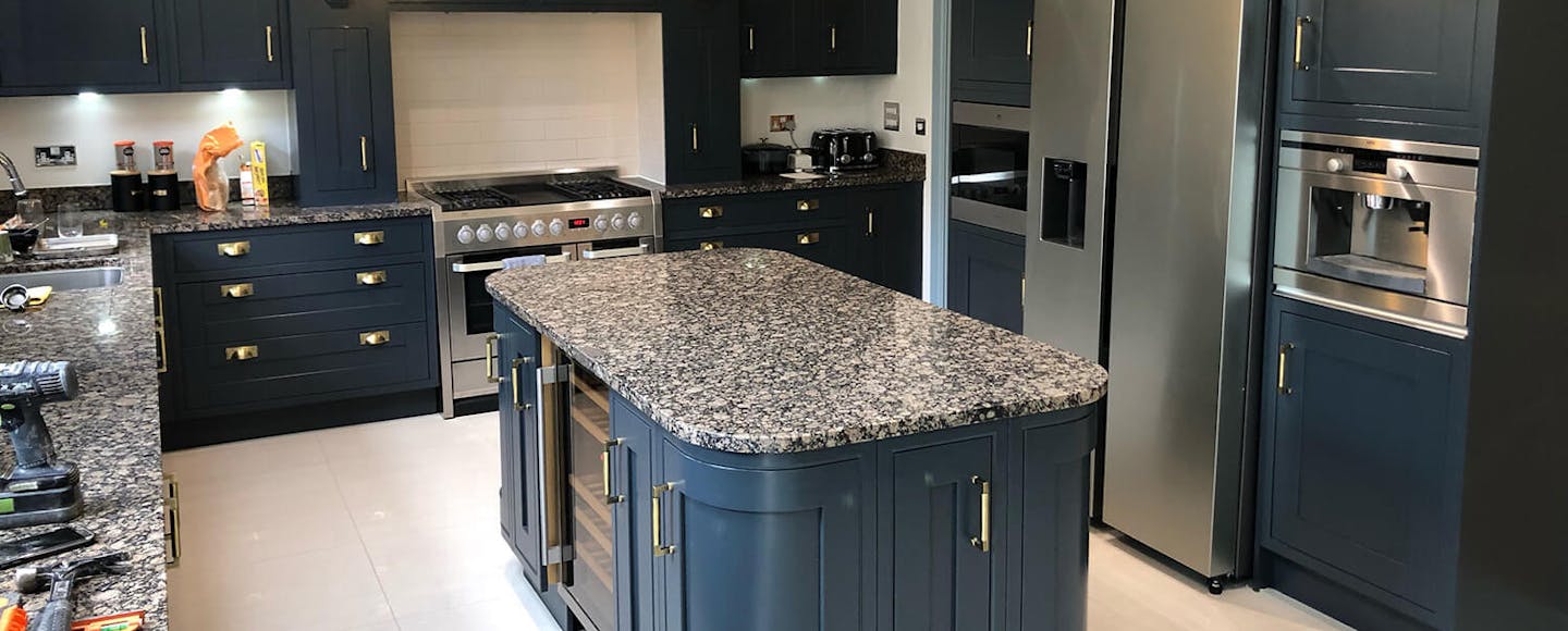 kitchen with deep blue cabinetry