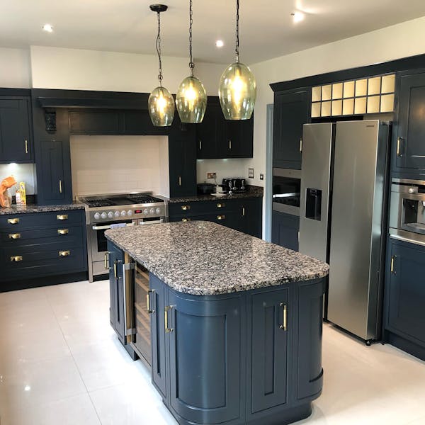 kitchen with deep blue cabinetry