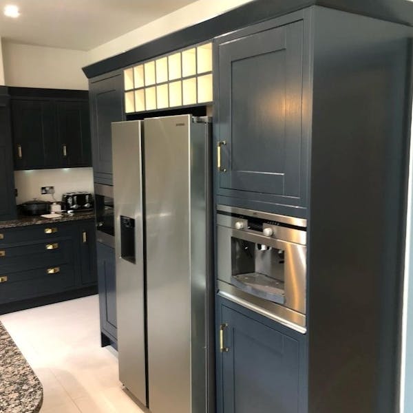 kitchen with deep blue cabinetry