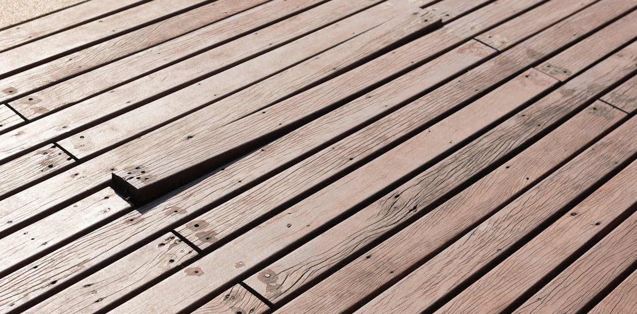brown decking with a loose board