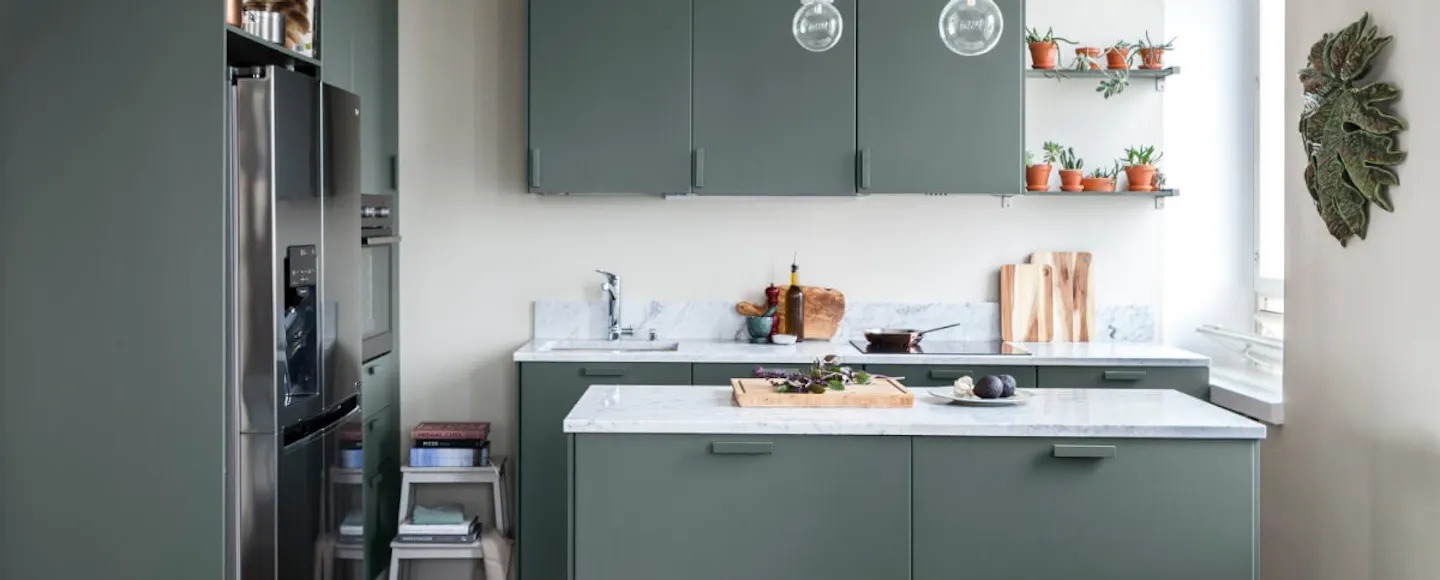 deep green/blue kitchen cabinets