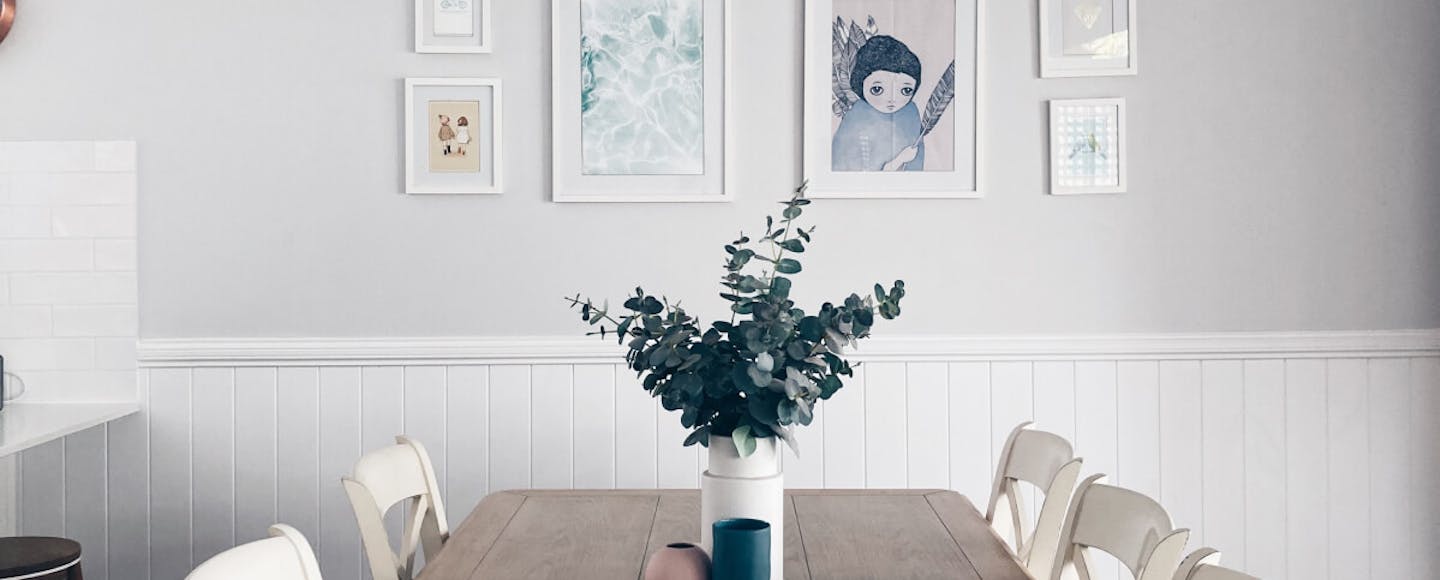 Dining room wall painted with a grey RAL paint colour