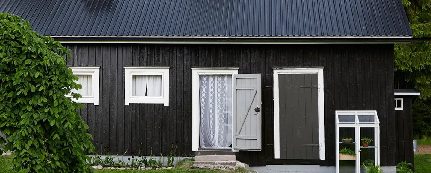 House with black wooden walls