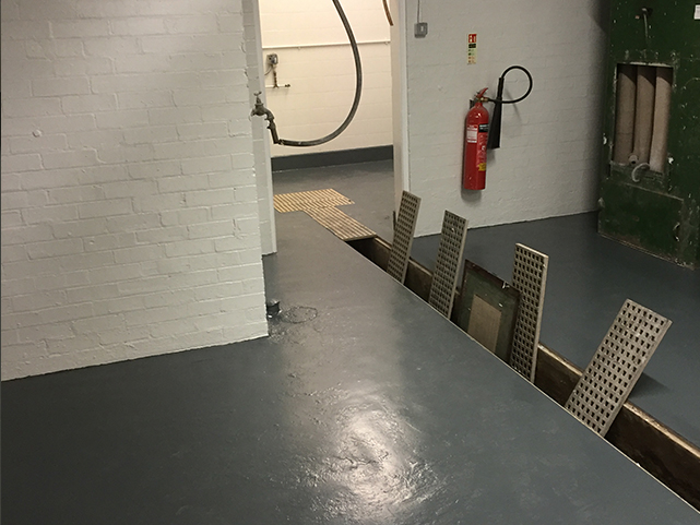 Painted ground with dark paint