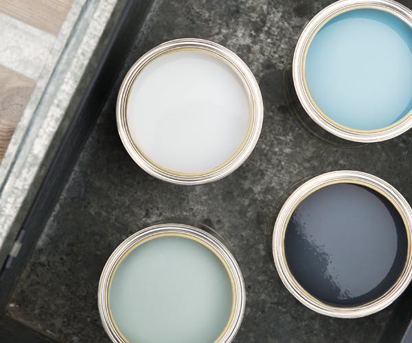 birdseye view blue paint tins open