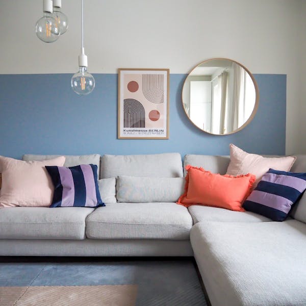 living room with a blue and white wall