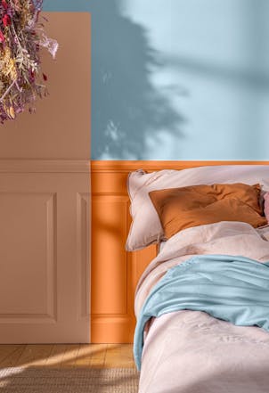 modern blue and peach bedroom decor