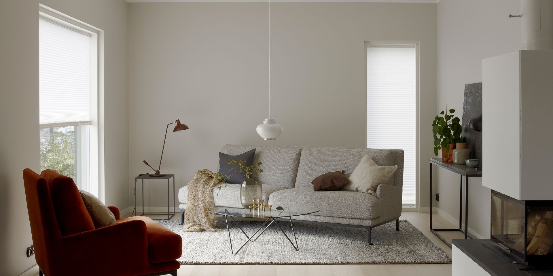 White Living Room with Couch and Rug