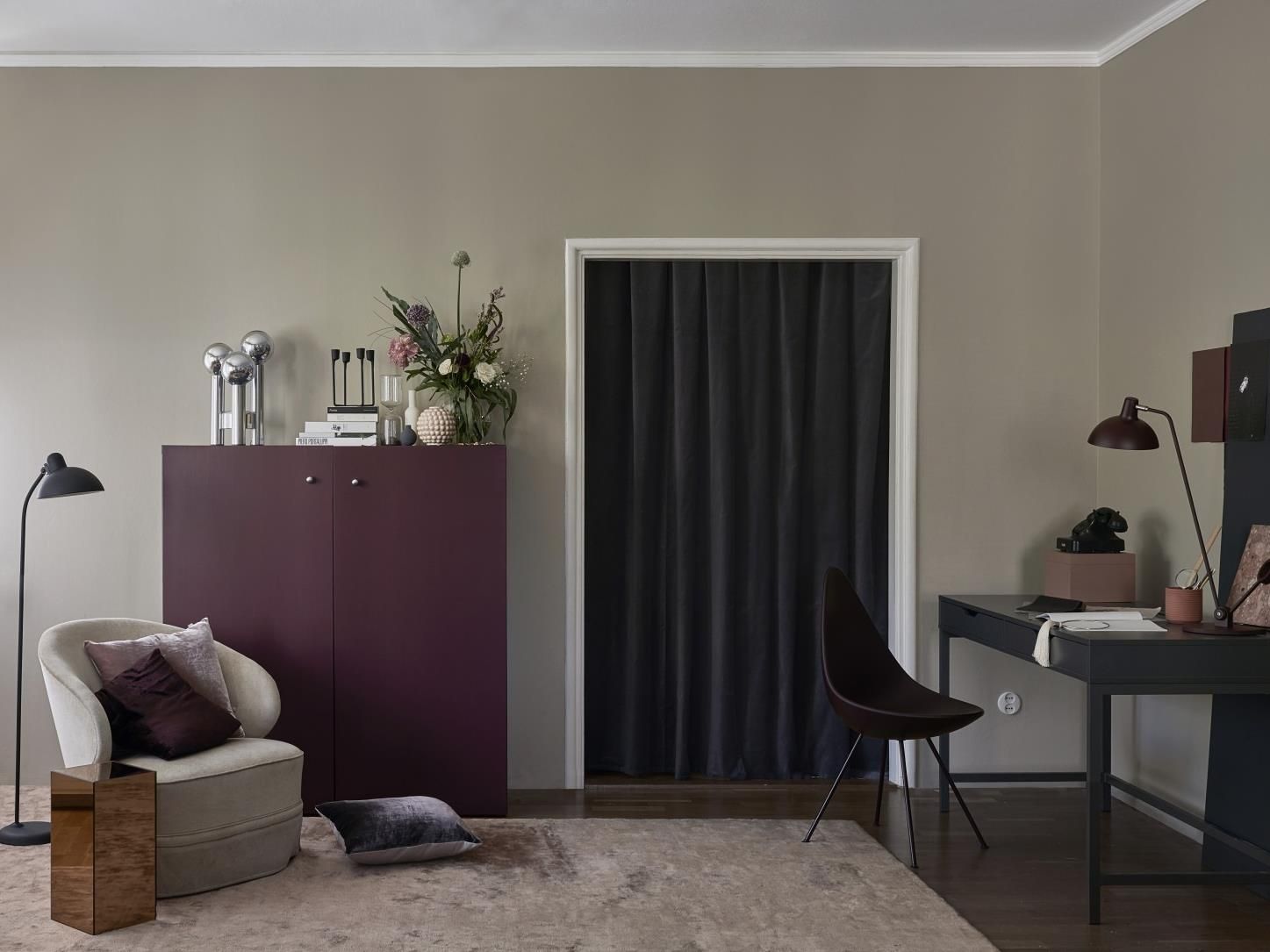 Beige Living Room with Burgundy Cabinet, Black Desk and Beige Armchair