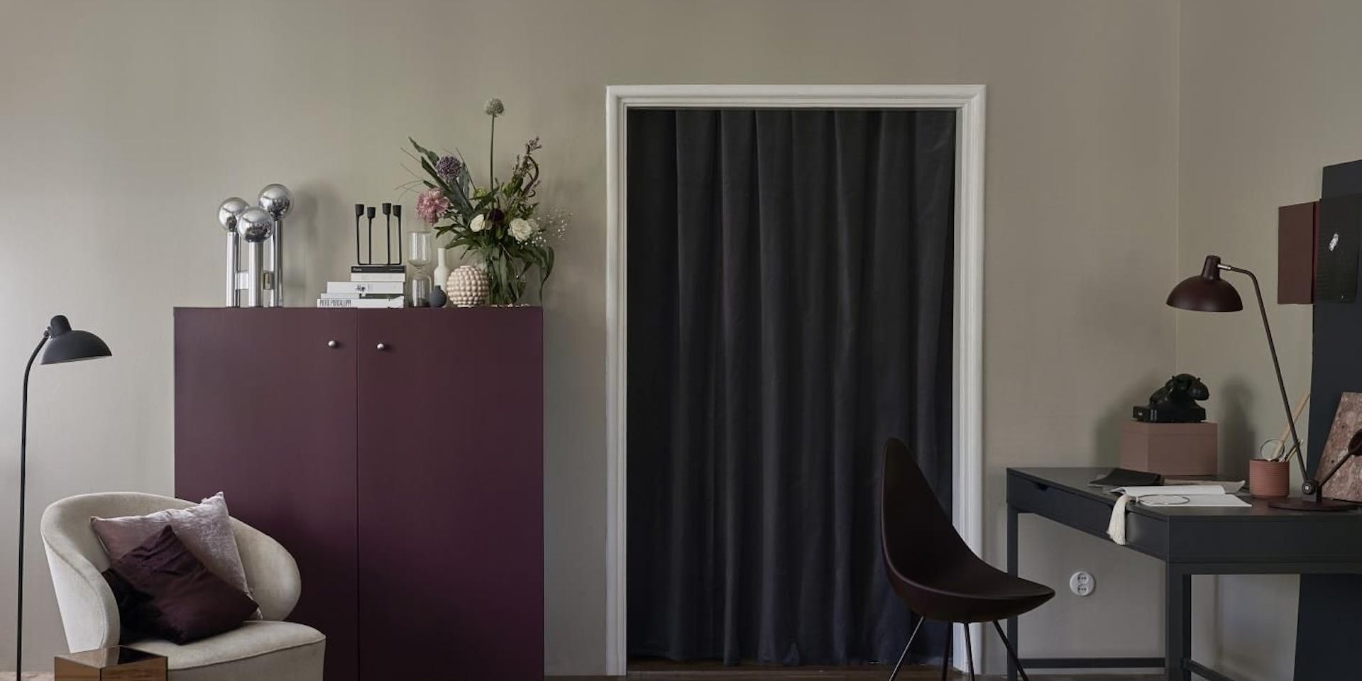 Beige Living Room with Burgundy Cabinet, Black Desk and Beige Armchair