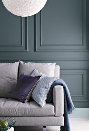 Panelled wall painted with Petrol S491