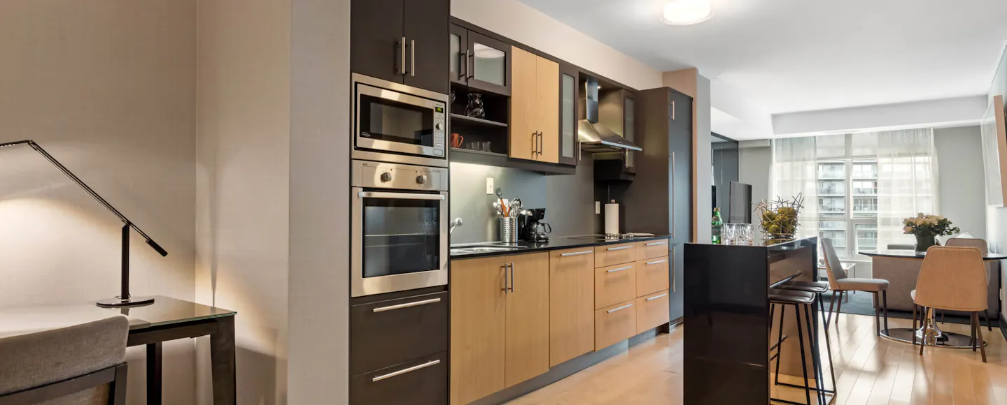 modern kitchen with a pale terracotta brown wall