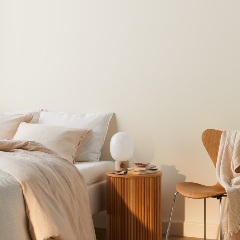 light beige wall  in a bedroom