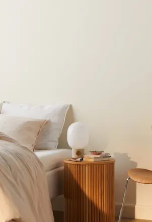 light beige wall in a bedroom