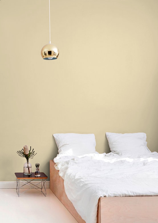 muted yellow bedroom wall