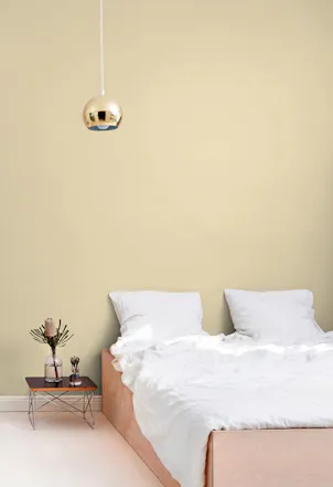 muted yellow bedroom wall