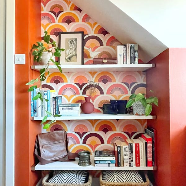 Practical storage with Terracotta painted wall