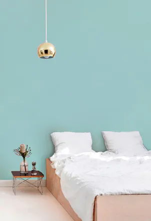 vibrant teal painted wall