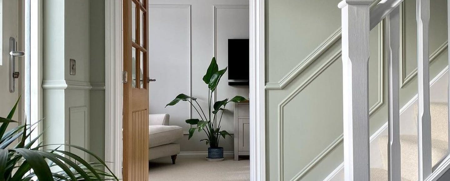 Hallway painted with a pale green paint colour