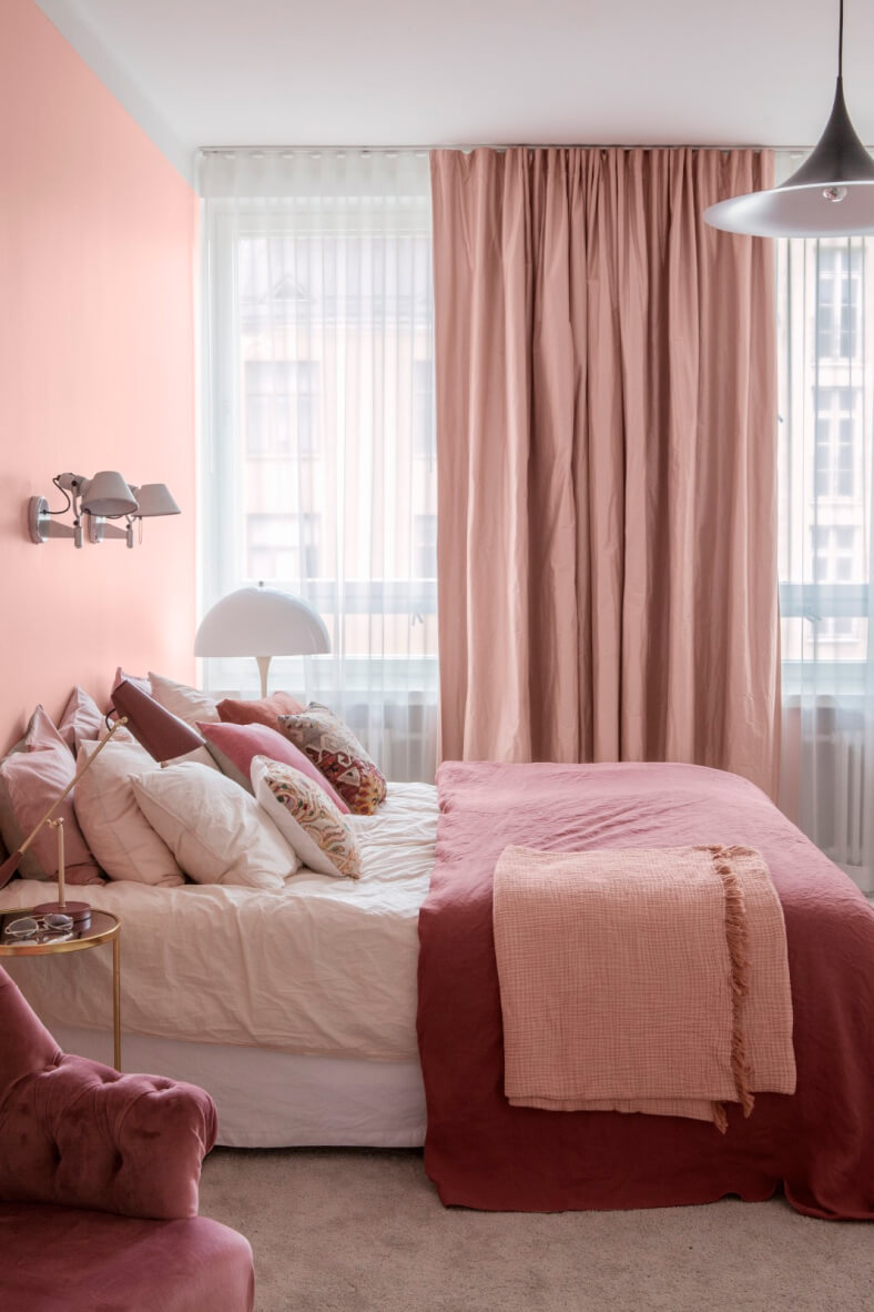 open and airy pink bedroom