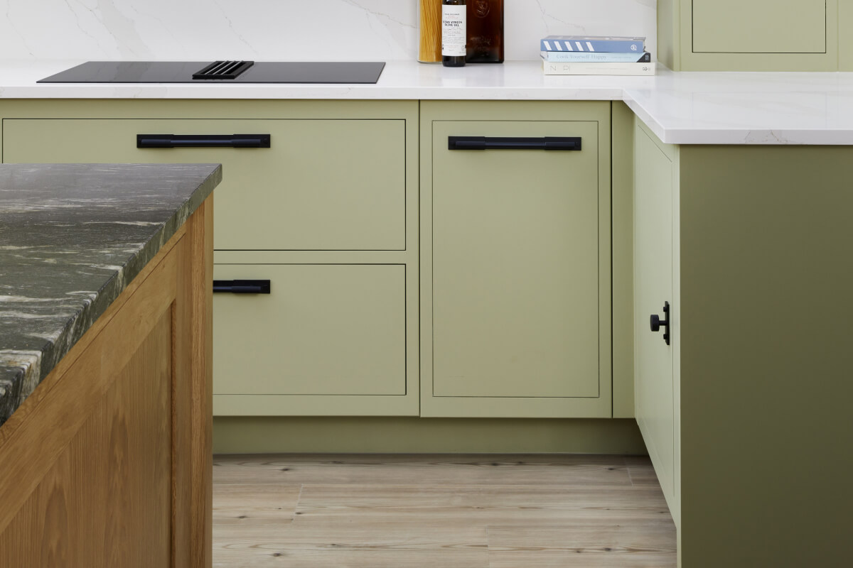 muted green kitchen cabinets 