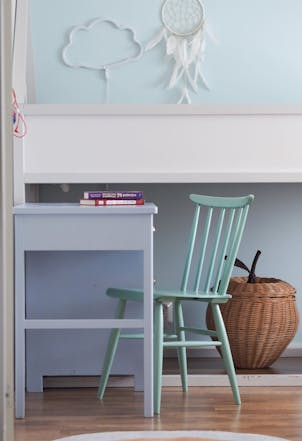 home office with a blue wall