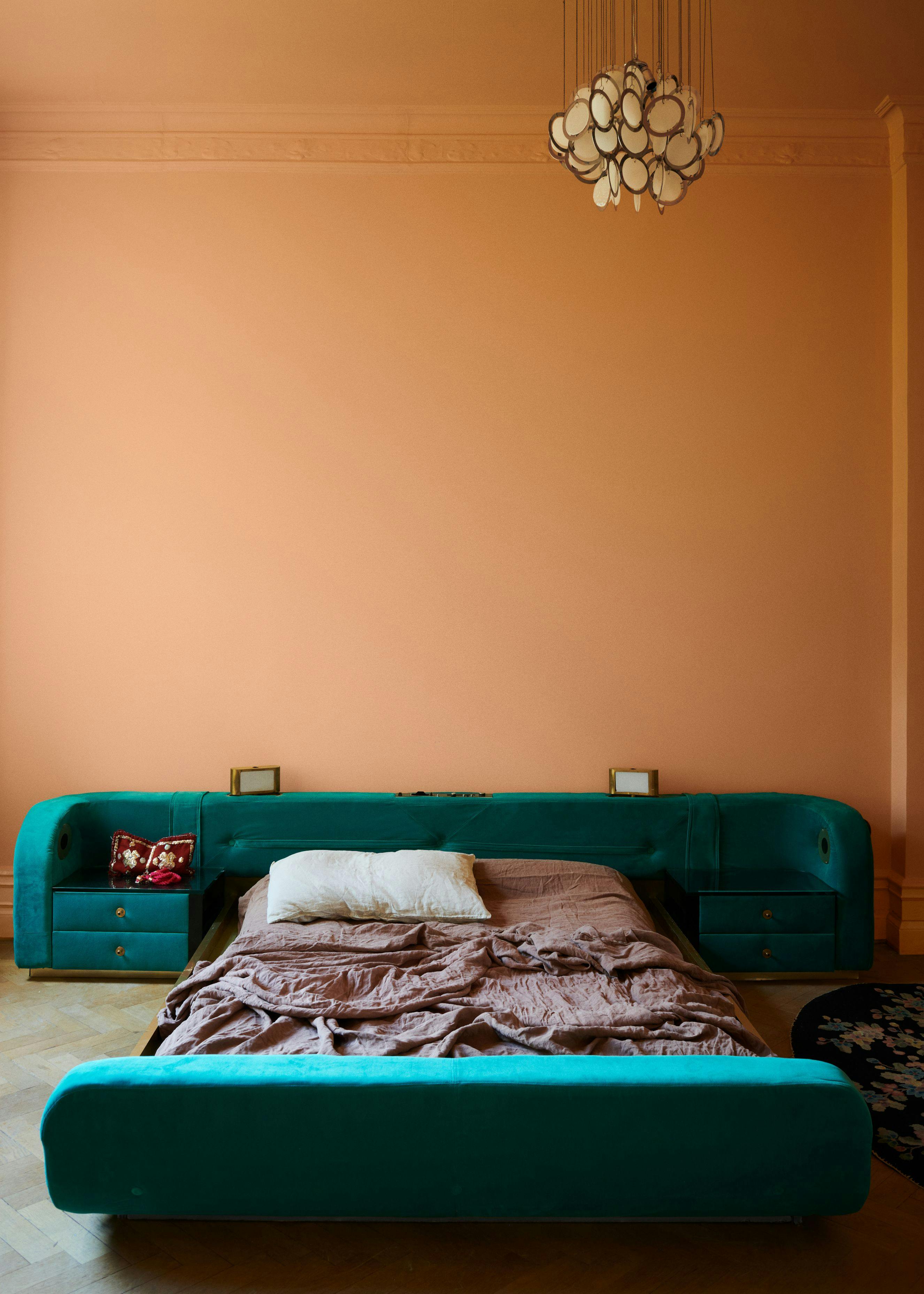 peach wall teal blue sofa bed