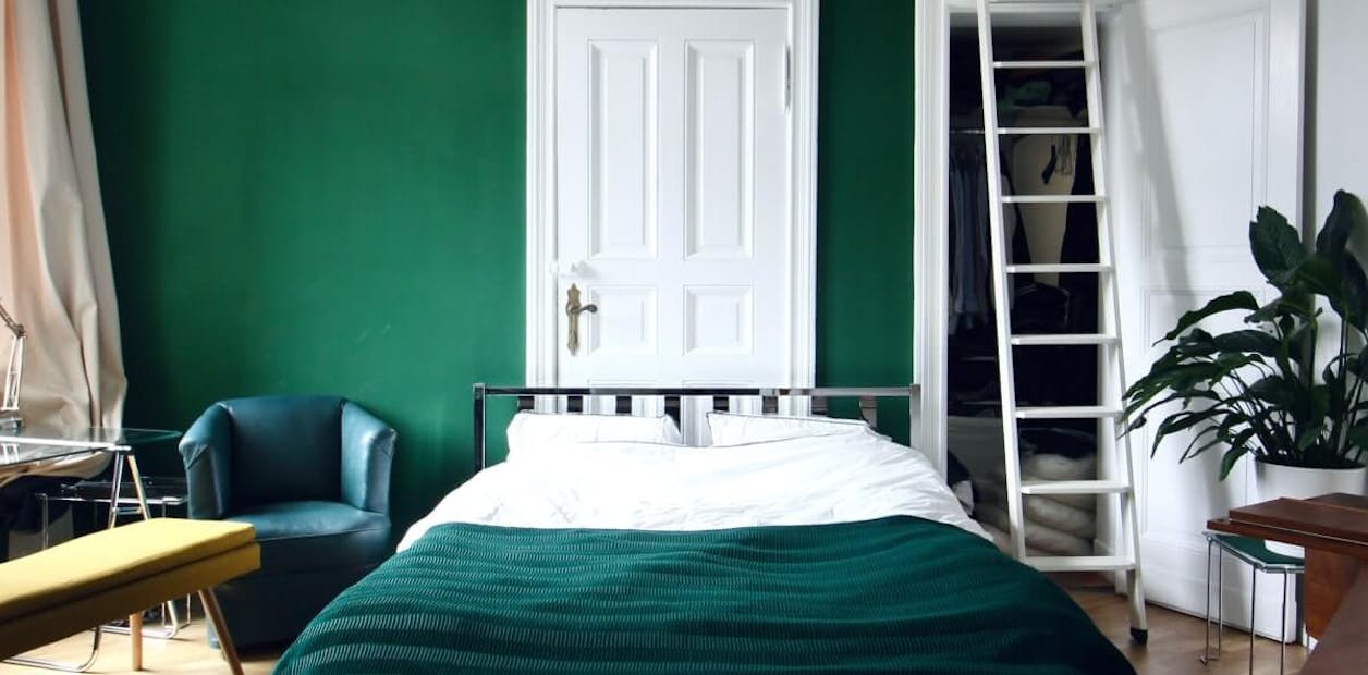 Deep green bedroom wall