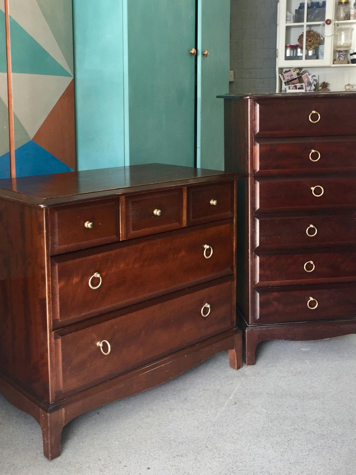 a set of midcentury chests of drawers