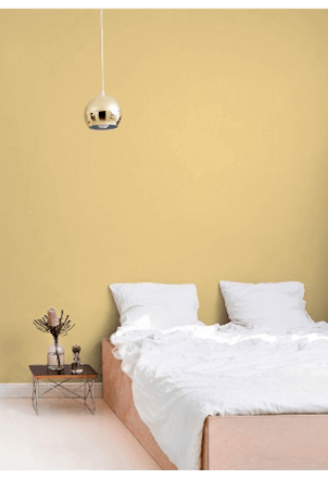 Bedroom wall with butter milk yellow paint