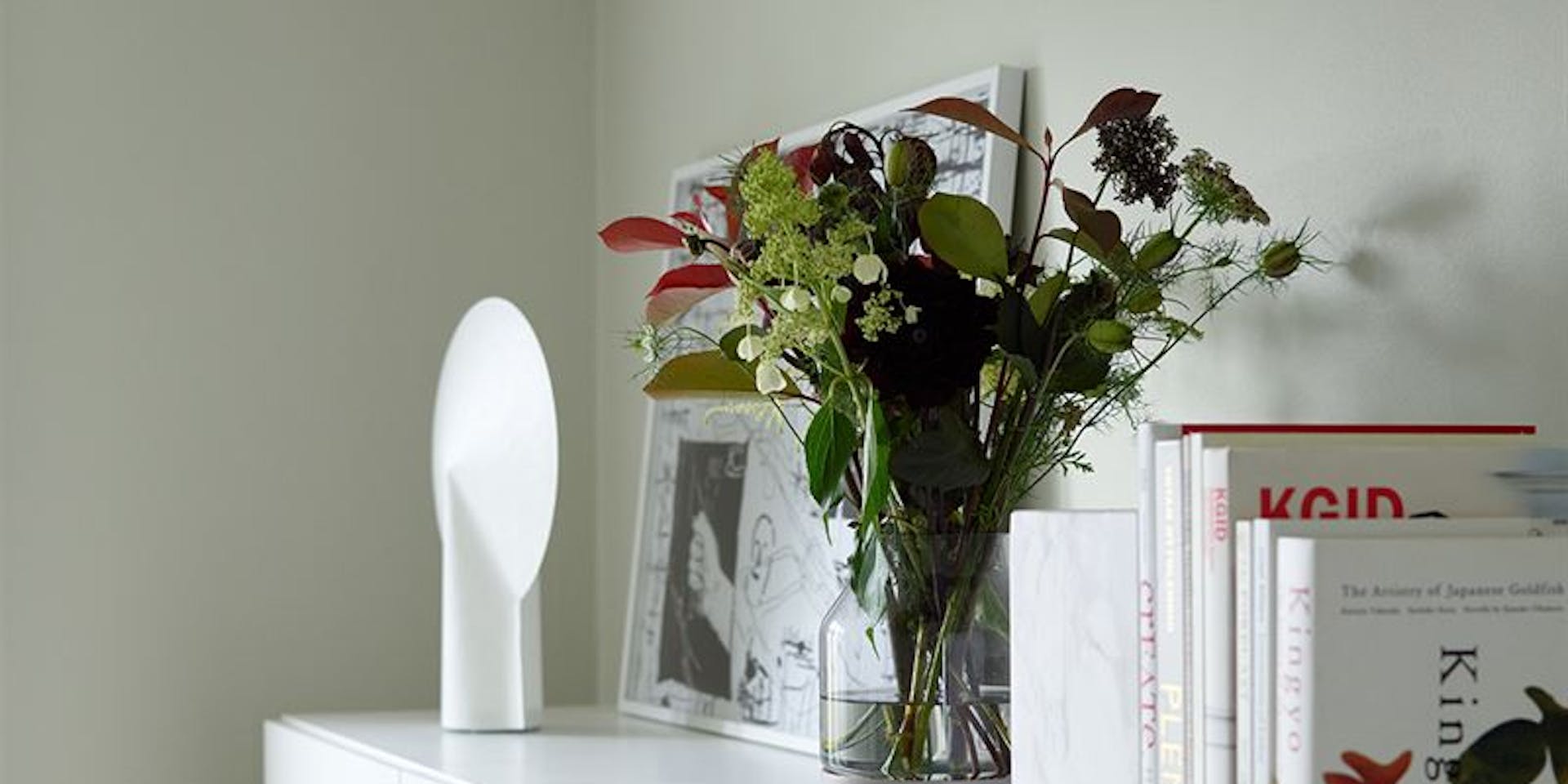 Vase of Flowers Table Green Wall Bright Bedroom - Hero Image