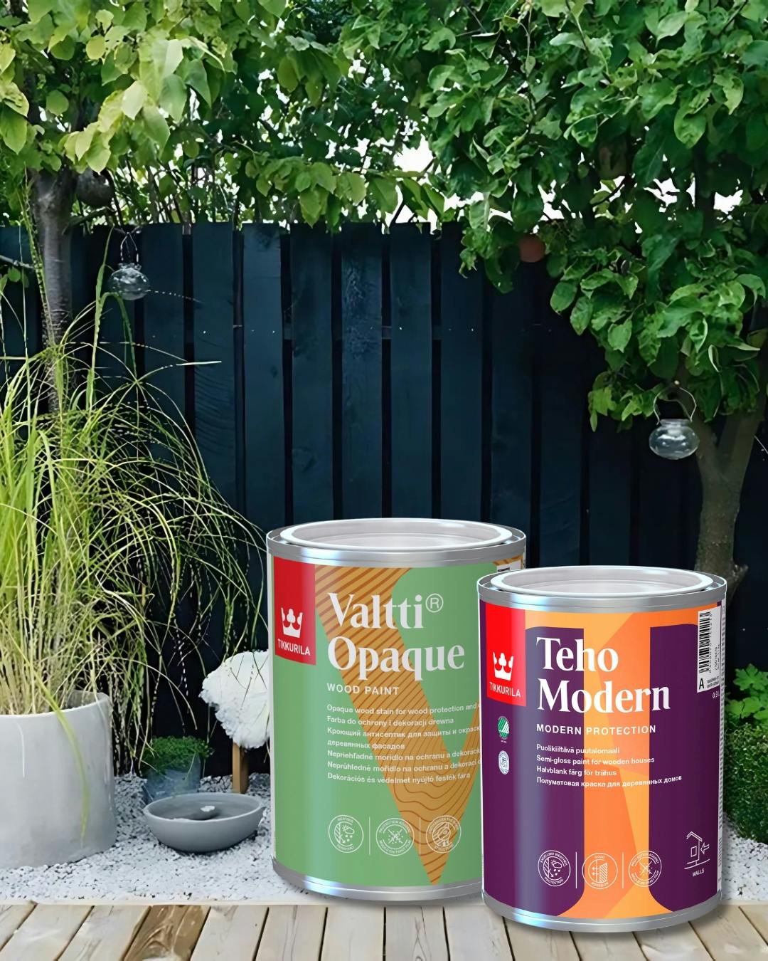 valtti opaque and teho modern tins against a black painted garden fence