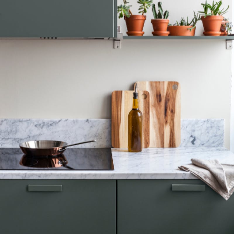 Green painted kitchen cupboards