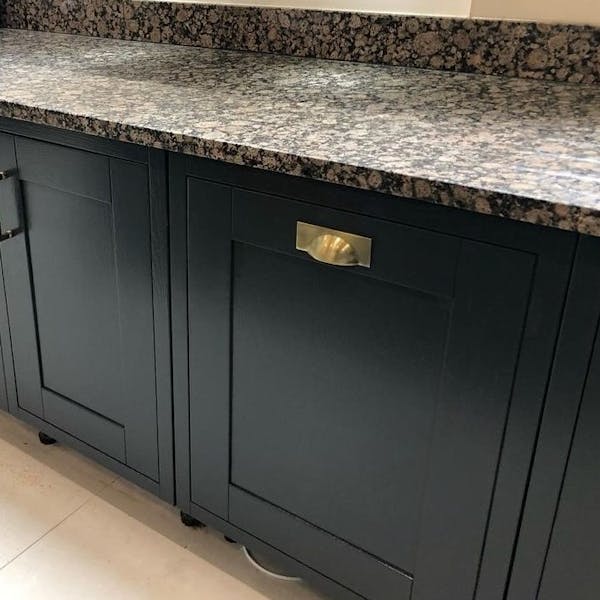 kitchen with deep blue cabinetry