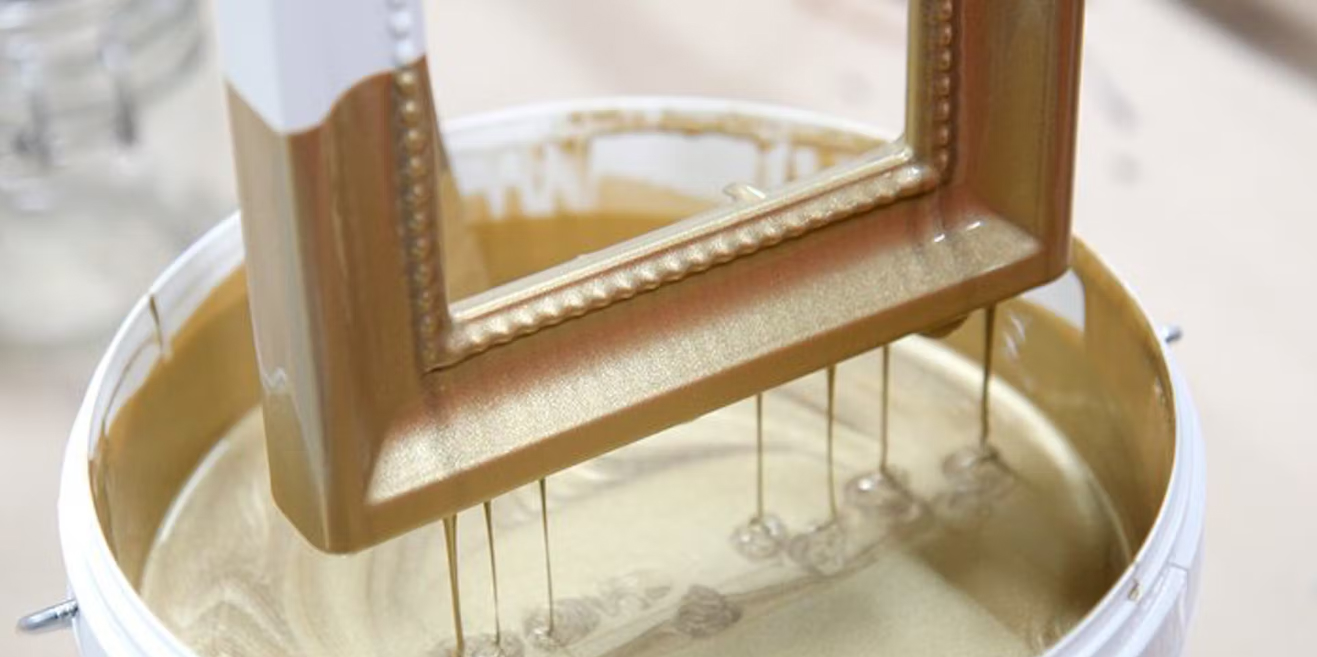 picture frame dipped in gold paint