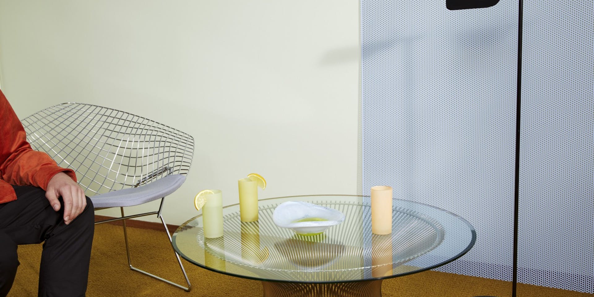table with glasses lime green and pale blue painted walls