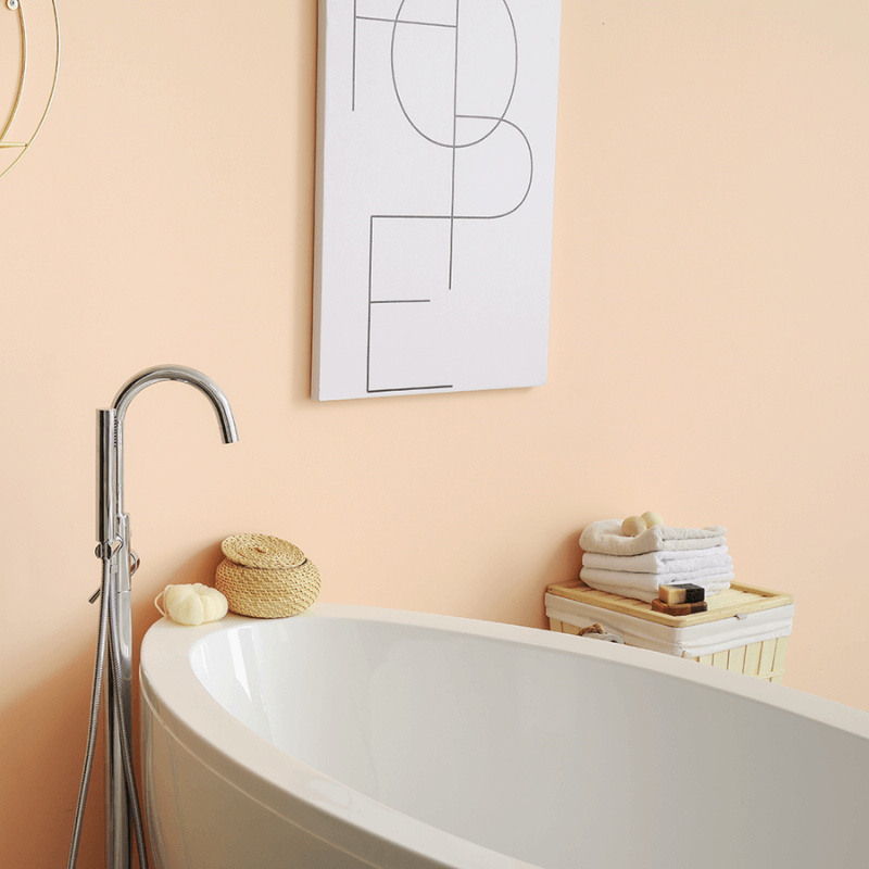 light orange-coral bathroom wall