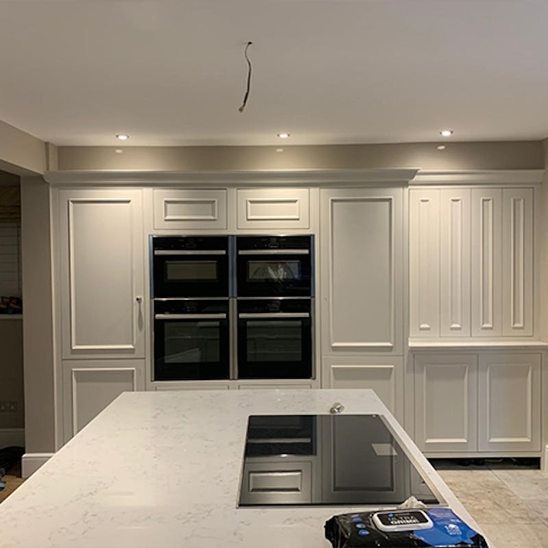 Contemporary kitchen units painted in Tikkurila white paint