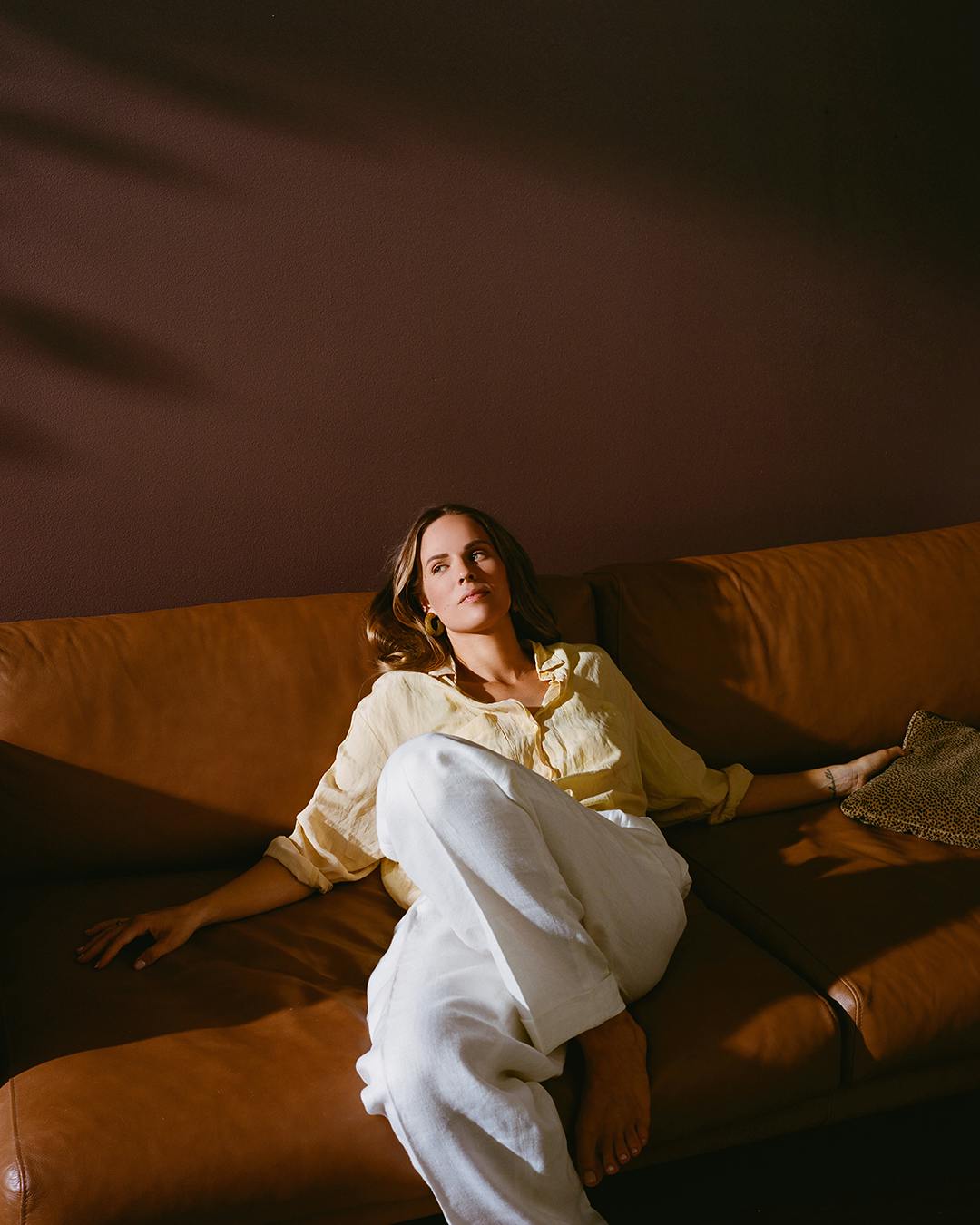 Women Relaxing with Red Brown Wall Paint background