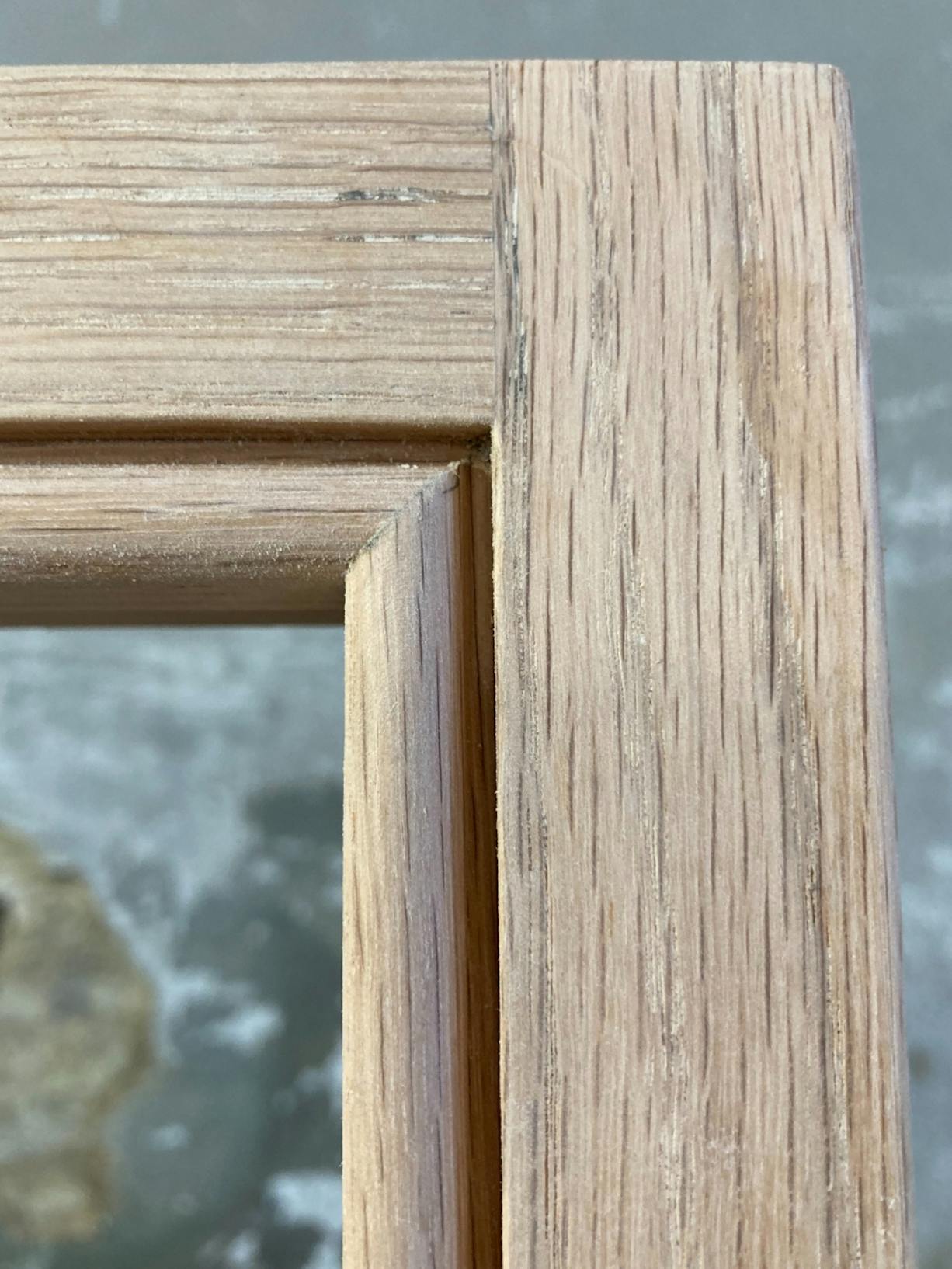 oak base wood before sanding and priming